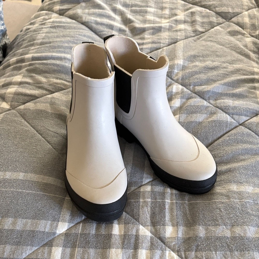 Never been worn.  J. Crew Women's White and Black Chelsea Ankle Rain Boots
